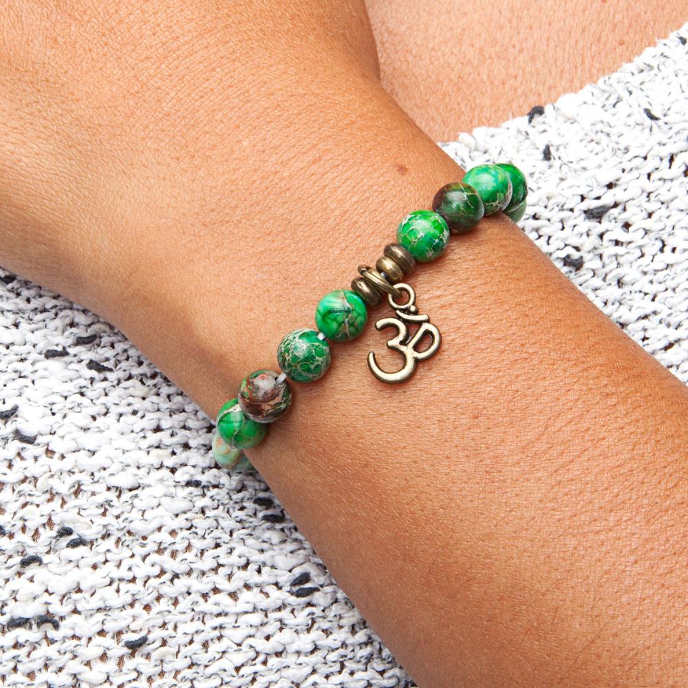 Mala armband groene Jaspis met Ohm bedel – Bodynova